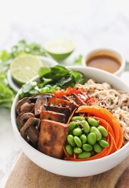 Nutty, sweet and spicy, these Almond Butter Tofu Ramen Bowls will change the way you think about tofu - for the better! | #vegan #glutenfree #highprotein #wholefoods | by Angela Simpson, culinary nutrition expert + blogger at eat-spin-run-repeat.com